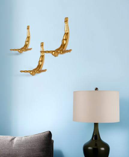 Set of Three Gold Resin Diving Man Hanging Dimensional Sculpture - Image 1