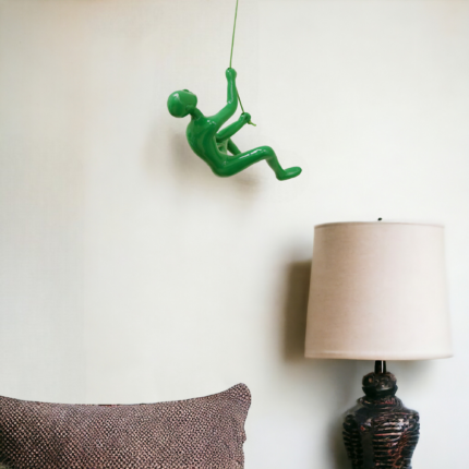 6" X 3" Green Resin Climbing Man Hanging Dimensional Sculpture - Image 1