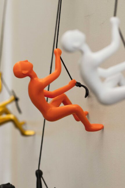 6" X 3" Orange Resin Climbing Man Hanging Dimensional Sculpture - Image 5