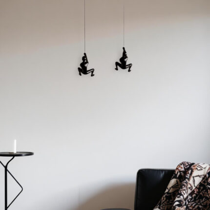Set of Two Black Resin Climbing Man Hanging Dimensional Sculpture - Image 1