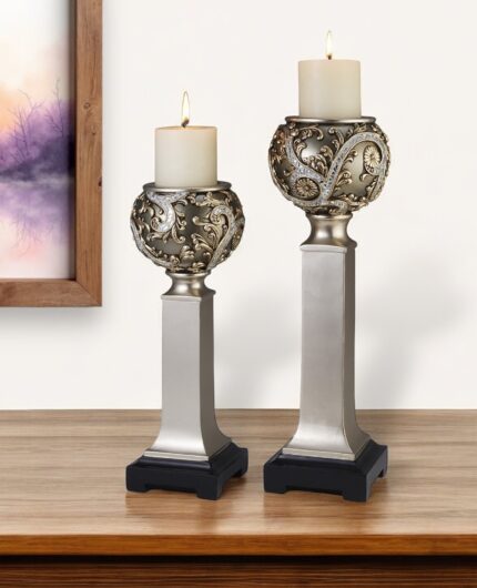 Set of Two Silver Polyresin Filigree Tabletop Pillar Candle Holders With Candle - Image 1
