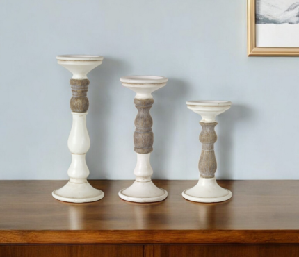 Set of Three Ivory and Natural Resin Tabletop Pillar Candle Holders - Image 1